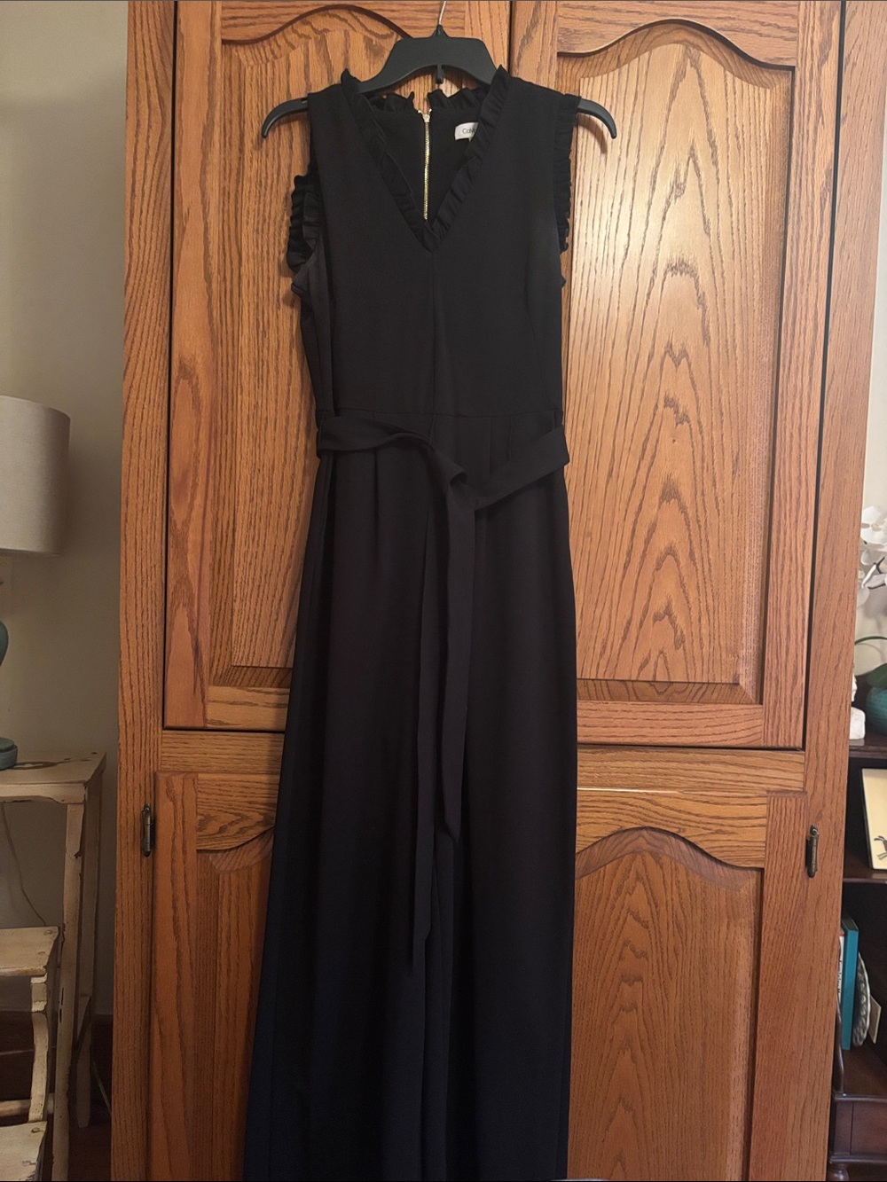 Elegant Black Calvin Klein Sleeveless Jumpsuit with Ruffle V-Neck